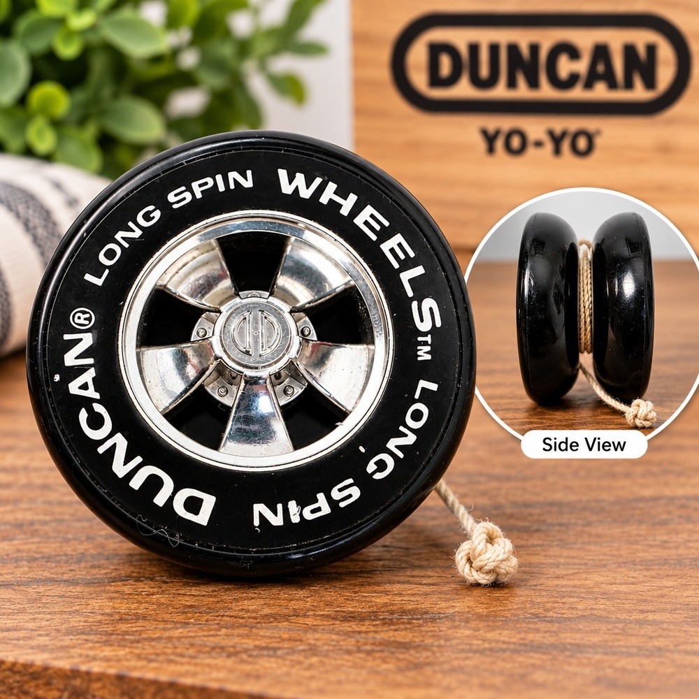 Vintage Duncan Wheels Long Spin Yo-Yo Black Chrome Rim